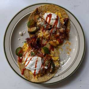 Homemade vegetarian tacos on corn tortillas